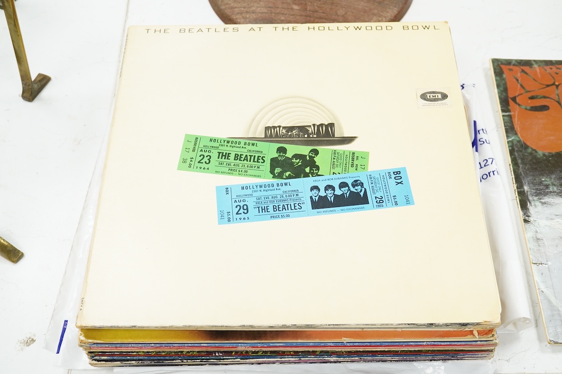 Fourteen The Beatles related LP record albums, including; Rubber Soul, The Beatles at the Hollywood Bowl, With The Beatles, Beatles For Sale, Sgt. Pepper, Revolver, McCartney II, Wings Over America, the Concert for Bangl